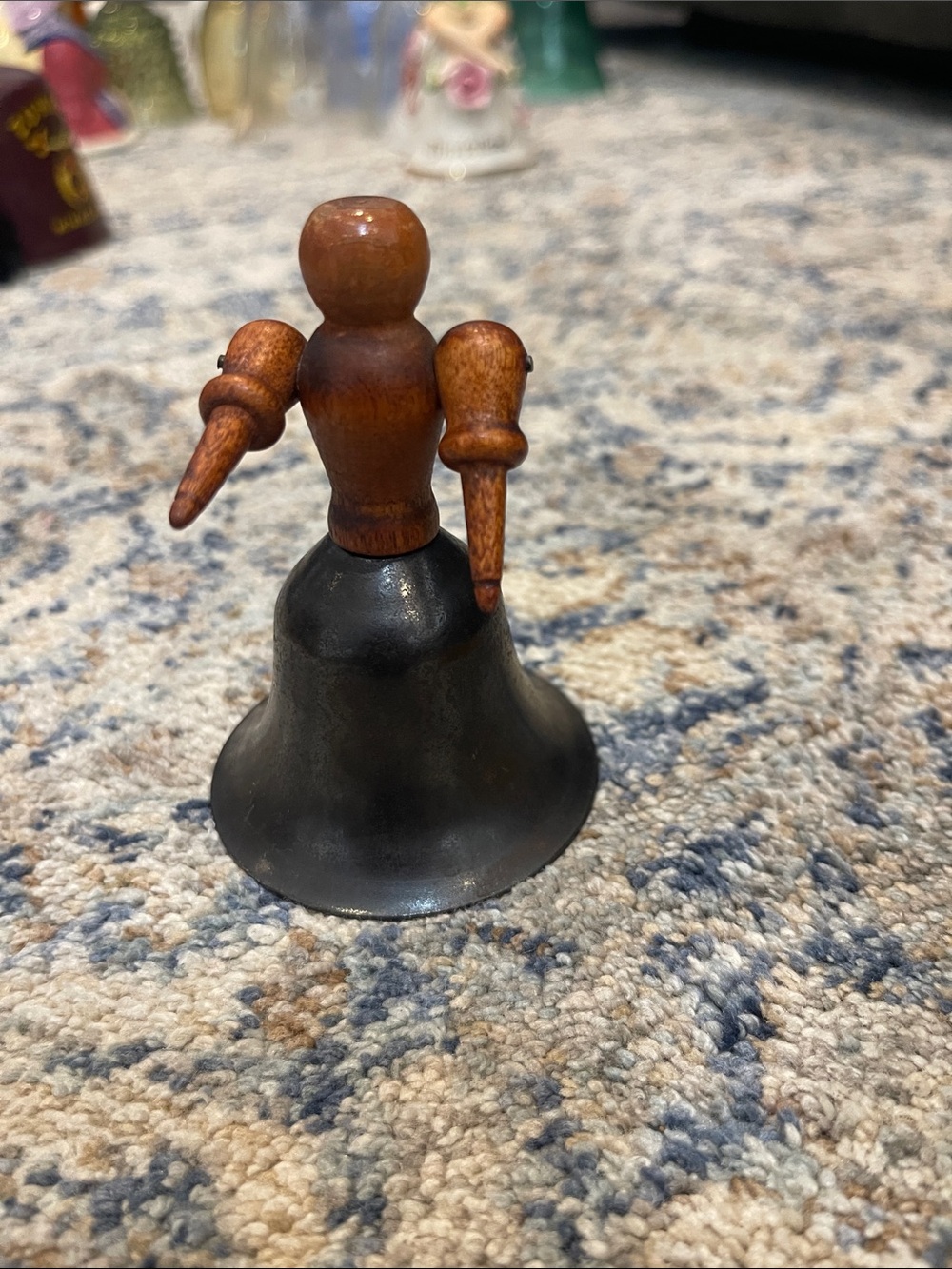 Antique Brown and Black Wooden-Handled Bell Sculpture